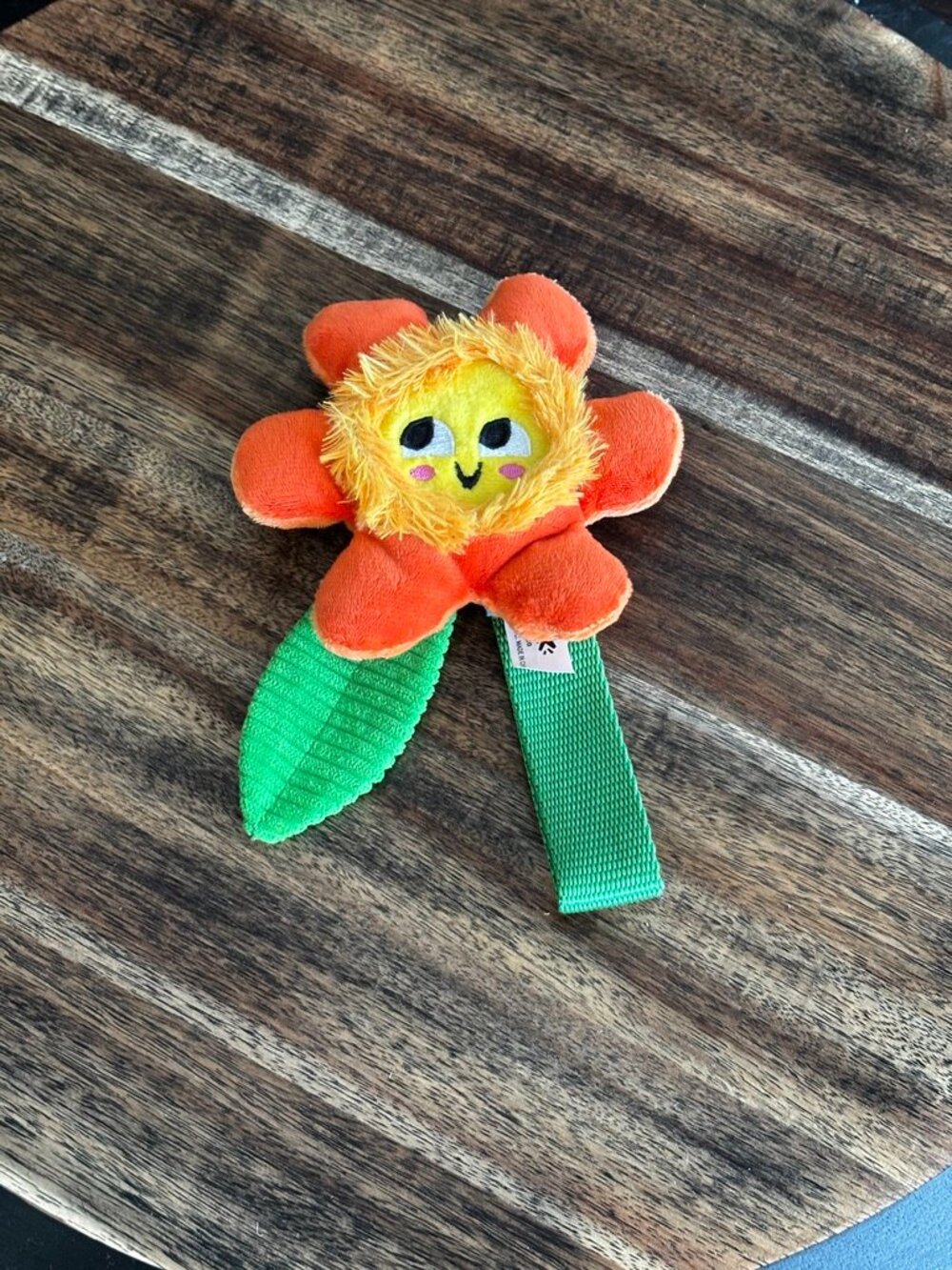 BARK Orange Flower Plush Tug Dog Toy Green Straps